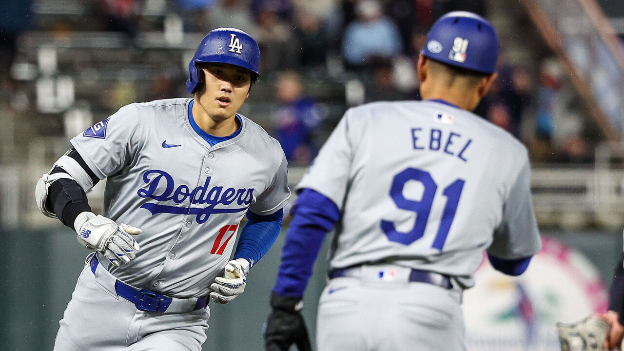 MINNEAPOLIS, MINNESOTA - APRIL 8: Shohei Ohtani #17 of the Los Angeles Dodgers celebrates his solo homerun with Dino Ebel #91 against the Minnesota Twins during the seventh inning at Target Field on April 8, 2024 in Minneapolis, Minnesota.