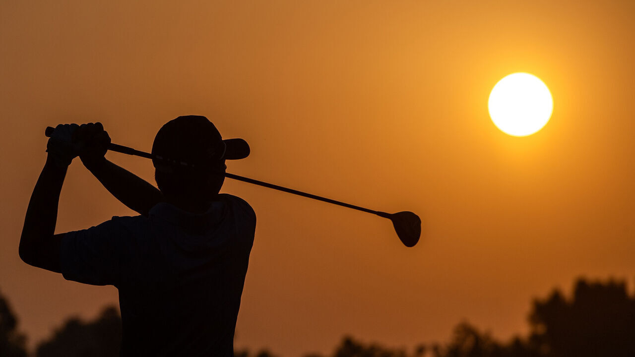ABU DHABI, UNITED ARAB EMIRATES - OCTOBER 18: Gordon Sargent of the United States warms up at sunrise during the 2023 World Amateur Team Championships - Eisenhower Trophy at Abu Dhabi Golf Club on October 18, 2023 in Abu Dhabi, United Arab Emirates.