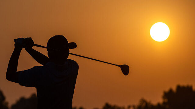ABU DHABI, UNITED ARAB EMIRATES - OCTOBER 18: Gordon Sargent of the United States warms up at sunrise during the 2023 World Amateur Team Championships - Eisenhower Trophy at Abu Dhabi Golf Club on October 18, 2023 in Abu Dhabi, United Arab Emirates.