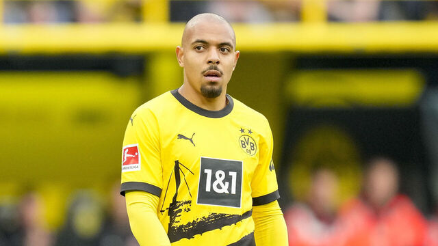 DORTMUND, GERMANY - MARCH 17: Donyell Malen of Borussia Dortmund looks on during the Bundesliga match between Borussia Dortmund and Eintracht Frankfurt at Signal Iduna Park on March 17, 2024 in Dortmund, Germany.