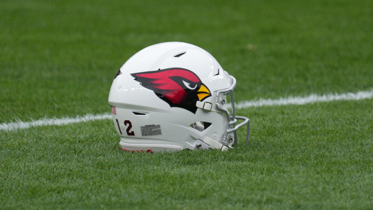PHILADELPHIA, PA - DECEMBER 31: Arizona Cardinals helmet sits on the field during the game between the Arizona Cardinals and the Philadelphia Eagles on December 31, 2023 at Lincoln Financial Field.
