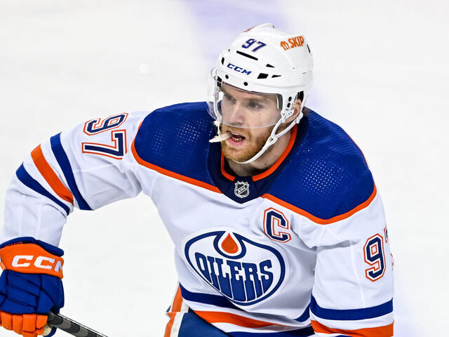 CALGARY, AB - APRIL 06: Edmonton Oilers Center Connor McDavid (97) in action during the second period of an NHL game between the Calgary Flames and the Edmonton Oilers on April 6, 2024, at the Scotiabank Saddledome in Calgary, AB.