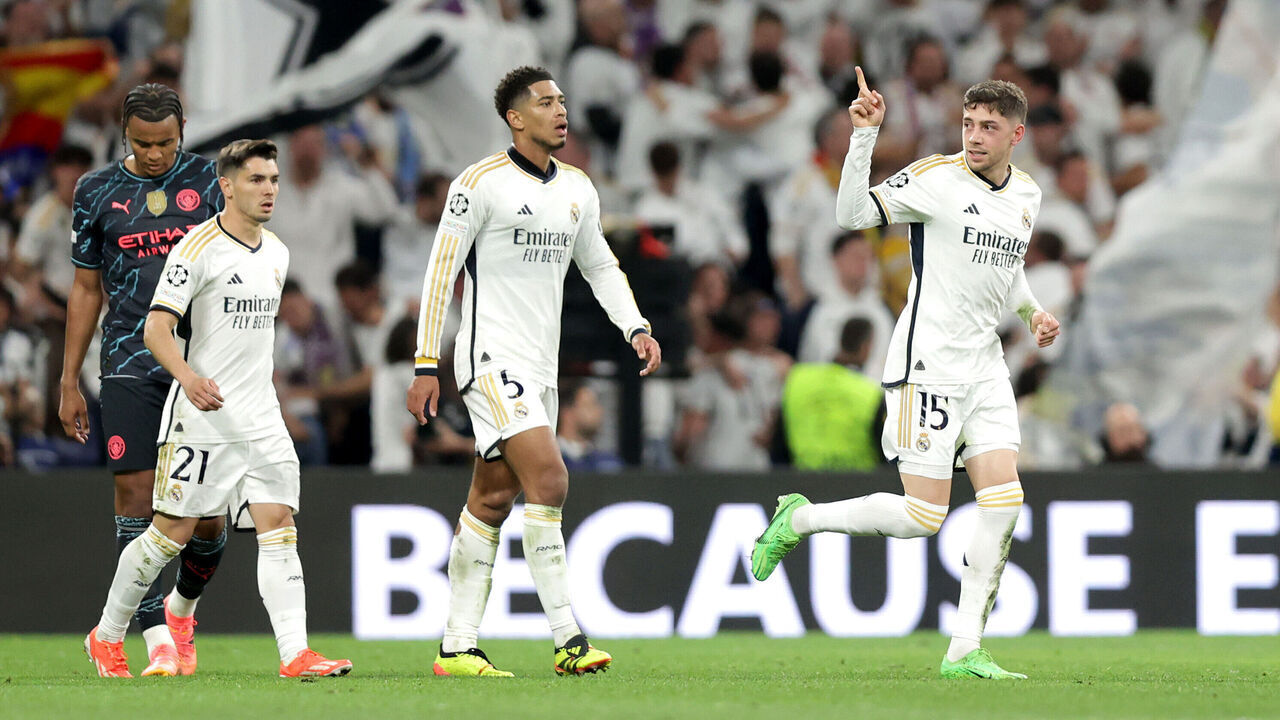 MADRID, SPAIN - APRIL 09: Federico Valverde of Real Madrid celebrates scoring his team's third goal during the UEFA Champions League quarter-final first leg match between Real Madrid CF and Manchester City at Estadio Santiago Bernabeu on April 09, 2024 in Madrid, Spain.
