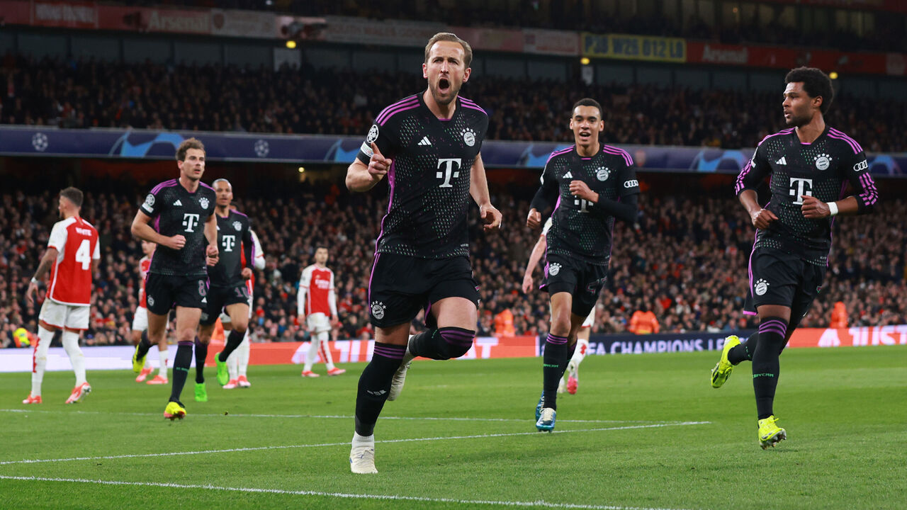 LONDON, ENGLAND - APRIL 9: Harry Kane of Bayern Munich celebrates scoring their 2nd goal during the UEFA Champions League quarter-final first leg match between Arsenal FC and FC Bayern Munchen at Emirates Stadium on April 9, 2024 in London, England.