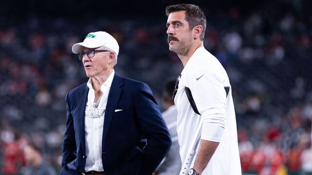 EAST RUTHERFORD, NEW JERSEY - OCTOBER 01: (L-R) New York Jets owner Woody Johnson talks with Aaron Rodgers #8 of the New York Jets prior to the game against the Kansas City Chiefs at MetLife Stadium on October 01, 2023 in East Rutherford, New Jersey.