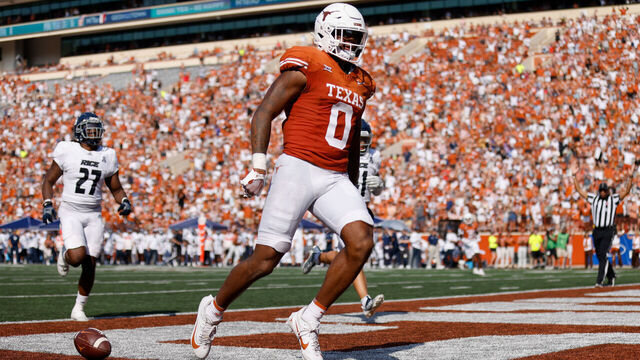 AUSTIN, TEXAS - SEPTEMBER 02: Ja'Tavion Sanders #0 of the Texas Longhorns scores a touchdown in the third quarter against the Rice Owls at Darrell K Royal-Texas Memorial Stadium on September 02, 2023 in Austin, Texas.