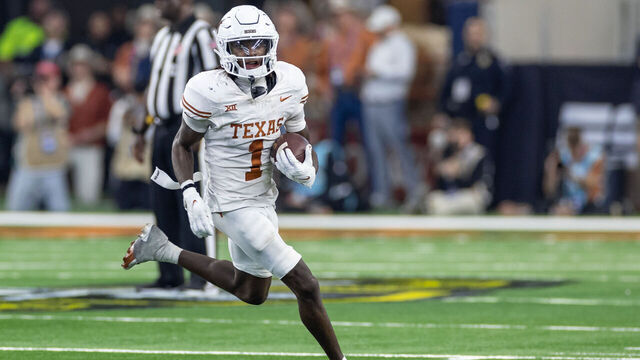 ARLINGTON, TX - DECEMBER 02: Texas Longhorns wide receiver Xavier Worthy (#1) runs up field after a catch during the Big 12 Championship football game between the Texas Longhorns and Oklahoma State Cowboys on December 02, 2023 at AT&T Studium in Arlington, Texas.
