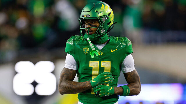 EUGENE, OREGON - NOVEMBER 24: Troy Franklin #11 of the Oregon Ducks gets set for the snap in the first half during a game against the Oregon State Beavers at Autzen Stadium on November 24, 2023 in Eugene, Oregon.