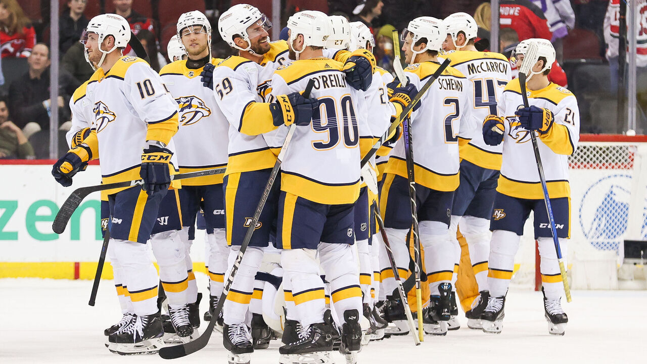 NEWARK, NJ - APRIL 07: Nashville Predators defenseman Roman Josi (59) and Nashville Predators center Ryan O'Reilly (90) celebrate after defeating the New Jersey Devils during a game between the Nashville Predators and New Jersey Devils on April 7, 2024 at Prudential Center in the Newark, New Jersey.