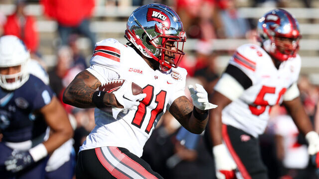 CHARLOTTE, NORTH CAROLINA - DECEMBER 18: Malachi Corley #11 of the Western Kentucky Hilltoppers runs the ball against the Old Dominion Monarchs during the first half of the Famous Toastery Bowl at Jerry Richardson Stadium on December 18, 2023 in Charlotte, North Carolina.