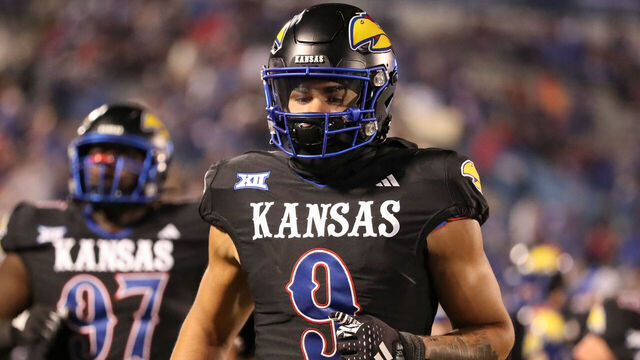 LAWRENCE, KS - NOVEMBER 18: Kansas Jayhawks defensive lineman Austin Booker (9) before a Big 12 football game between the Kansas State Wildcats and Kansas Jayhawks on Nov 18, 2023 at Memorial Stadium in Lawrence, KS.