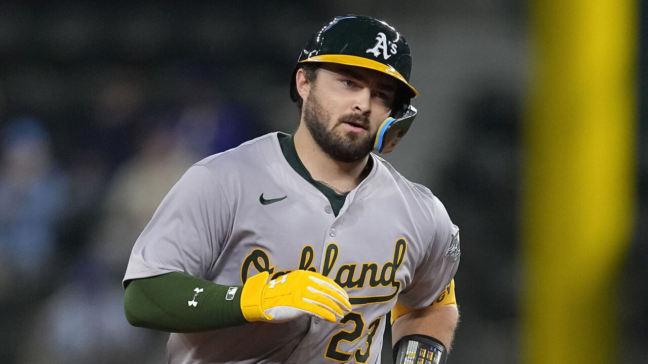ARLINGTON, TEXAS - APRIL 09: Shea Langeliers #23 of the Oakland Athletics runs the bases after hitting his third home run of the game during the ninth inning against the Texas Rangers at Globe Life Field on April 09, 2024 in Arlington, Texas.