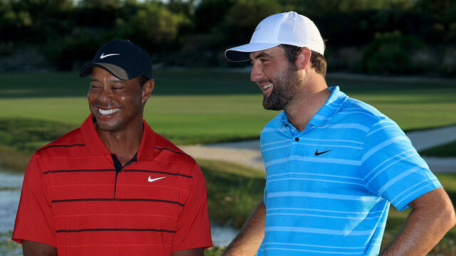 NASSAU, BAHAMAS - DECEMBER 03: Scottie Scheffler of The United States beside the Hero World Challenge Trophy with tournament host Tiger Woods of The United States after his win in the final round of the Hero World Challenge at Albany Golf Course on December 03, 2023 in Nassau, .