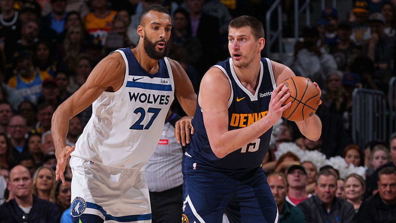 DENVER, CO - APRIL 10: Rudy Gobert #27 of the Minnesota Timberwolves plays defense against Nikola Jokic #15 of the Denver Nuggets during the game on April 10, 2024 at the Ball Arena in Denver, Colorado. NOTE TO USER: User expressly acknowledges and agrees that, by downloading and/or using this Photograph, user is consenting to the terms and conditions of the Getty Images License Agreement. Mandatory Copyright Notice: Copyright 2024 NBAE