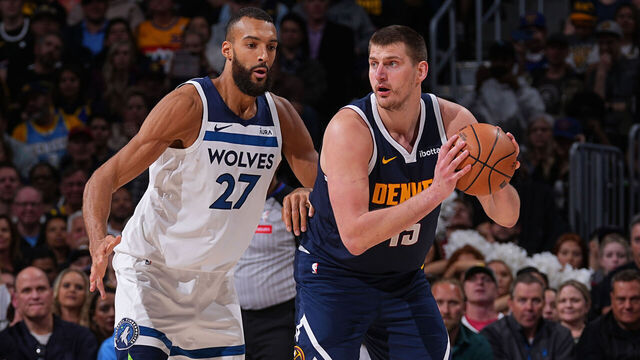 DENVER, CO - APRIL 10: Rudy Gobert #27 of the Minnesota Timberwolves plays defense against Nikola Jokic #15 of the Denver Nuggets during the game on April 10, 2024 at the Ball Arena in Denver, Colorado. NOTE TO USER: User expressly acknowledges and agrees that, by downloading and/or using this Photograph, user is consenting to the terms and conditions of the Getty Images License Agreement. Mandatory Copyright Notice: Copyright 2024 NBAE
