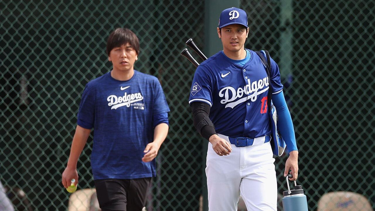 GLENDALE, ARIZONA - FEBRUARY 27: Shohei Ohtani #17 of the Los Angeles Dodgers and interpreter Ippei Mizuhara arrive to a game against the Chicago White Sox at Camelback Ranch on February 27, 2024 in Glendale, Arizona.