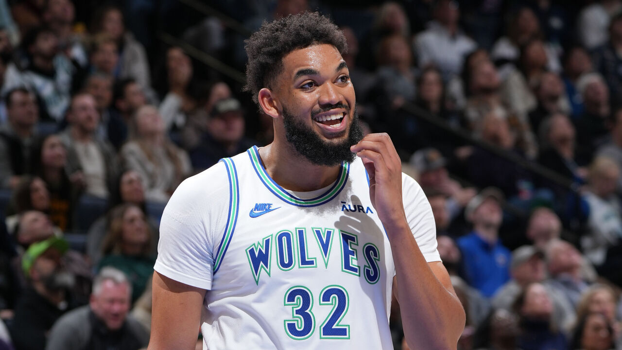 MINNEAPOLIS, MN - FEBRUARY 23: Karl-Anthony Towns #32 of the Minnesota Timberwolves smiles against the Milwaukee Bucks on February 23, 2024 at Target Center in Minneapolis, Minnesota. Mandatory Copyright Notice: Copyright 2024 NBAE