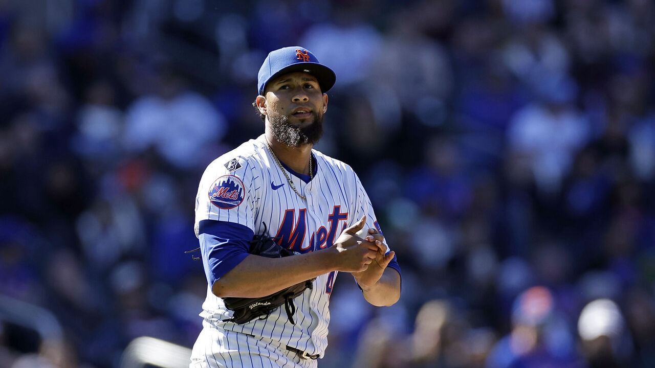 NEW YORK, NY - MARCH 31: Yohan Ramirez #46 of the New York Mets reacts against the Milwaukee Brewers during the fifth inning at Citi Field on March 31, 2024 in New York City.
