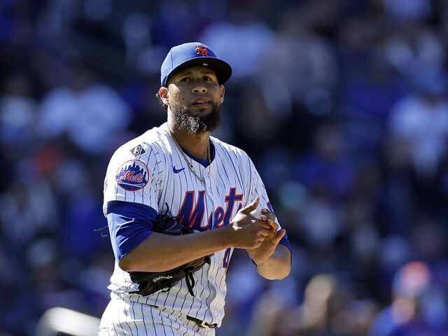 NEW YORK, NY - MARCH 31: Yohan Ramirez #46 of the New York Mets reacts against the Milwaukee Brewers during the fifth inning at Citi Field on March 31, 2024 in New York City.