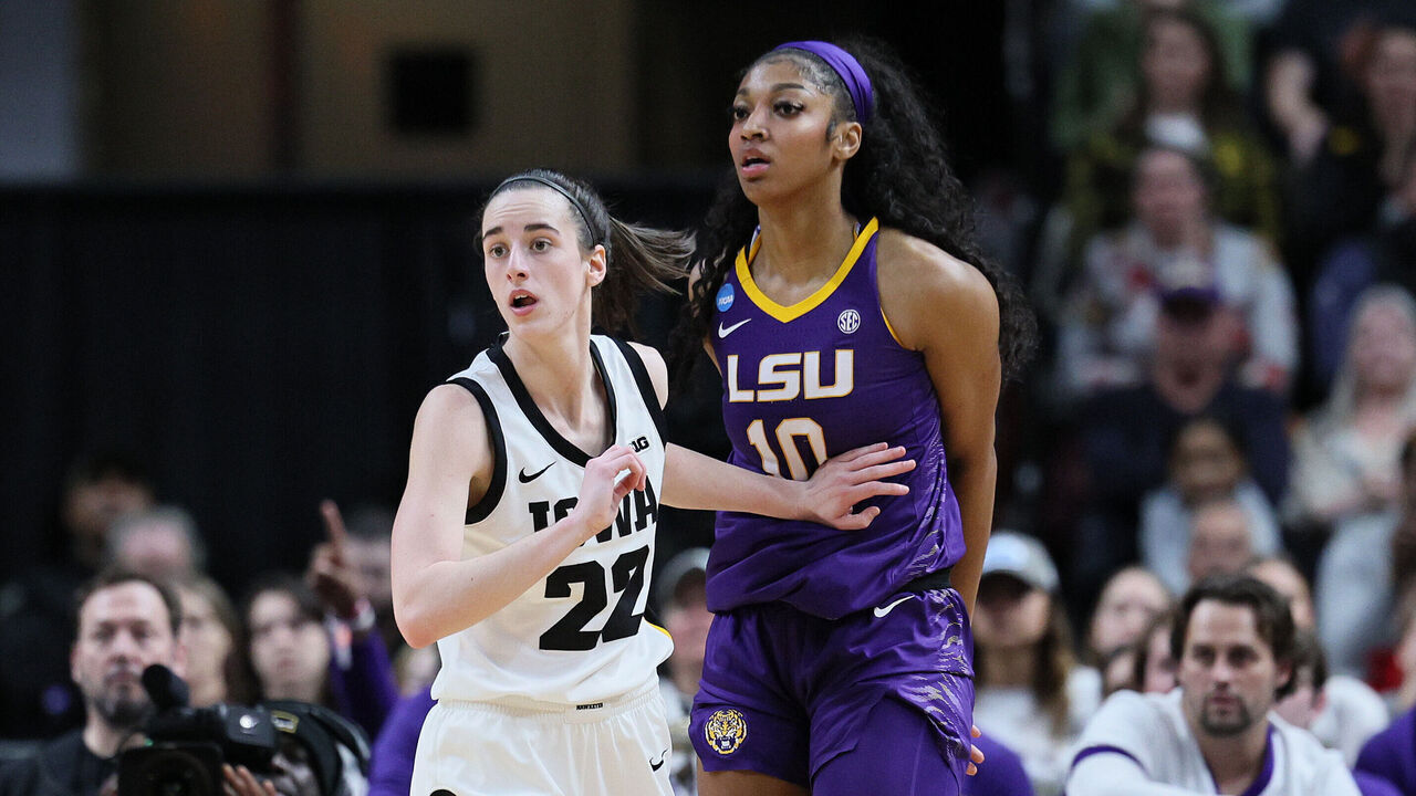 ALBANY, NEW YORK - APRIL 01: Caitlin Clark #22 of the Iowa Hawkeyes and Angel Reese #10 of the LSU Tigers during the finals of the NCAA Women's Basketball Tournament - Albany Regional at MVP Arena on April 01, 2024 in Albany, New York.