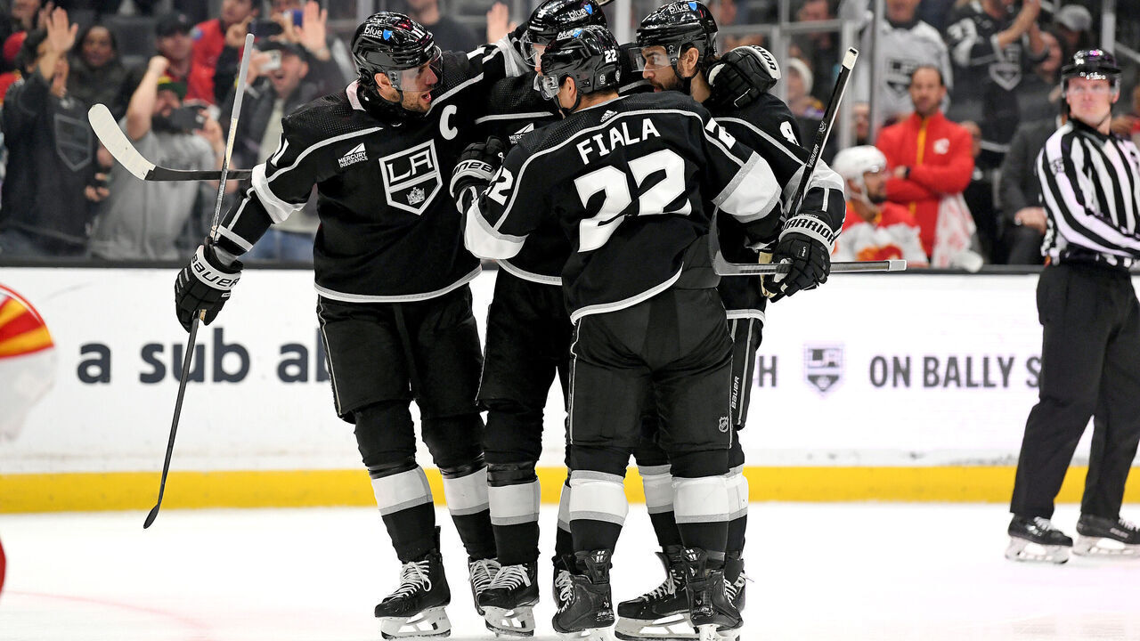LOS ANGELES, CA - APRIL 11: Los Angeles Kings Center Anze Kopitar (11) and teammates celebrate a goal scored by Los Angeles Kings Left Wing Kevin Fiala (22) during a game between the Calgary Flames and the Los Angeles Kings on April 11th, 2024 at the Crypto.com Arena in Los Angeles, CA.