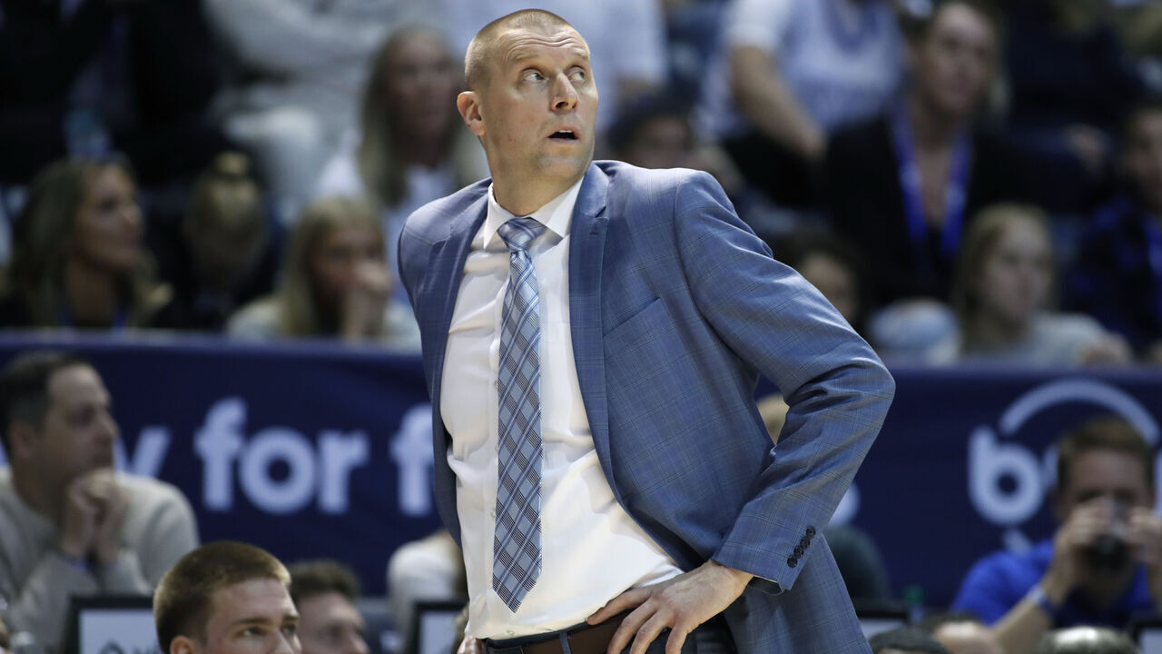 PROVO, UT - FEBRUARY 20 : Head coach Mark Pope of the Brigham Young Cougars watches a replay during the first half against the Baylor Bears at the Marriott Center on February 20, 2024 in Provo, Utah.
