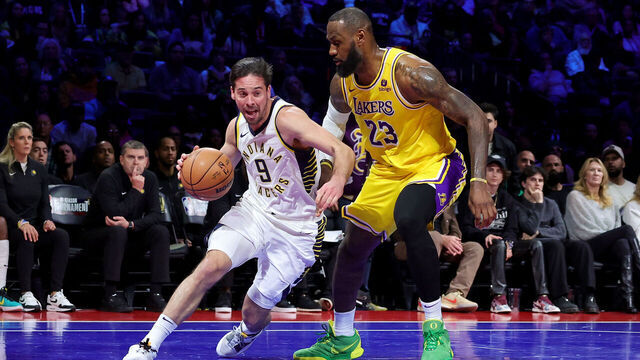 LAS VEGAS, NEVADA - DECEMBER 09: T.J. McConnell #9 of the Indiana Pacers drives to the basket against LeBron James #23 of the Los Angeles Lakers during the fourth quarter in the championship game of the inaugural NBA In-Season Tournament at T-Mobile Arena on December 09, 2023 in Las Vegas, Nevada.
