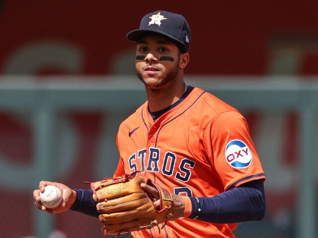 KANSAS CITY, MO - APRIL 11: Houston Astros shortstop Jeremy Peña (3) prepares to throw to first base during an MLB game between the Houston Astros and Kansas City Royals on Apr 11, 2024 at Kauffman Stadium in Kansas City, MO.