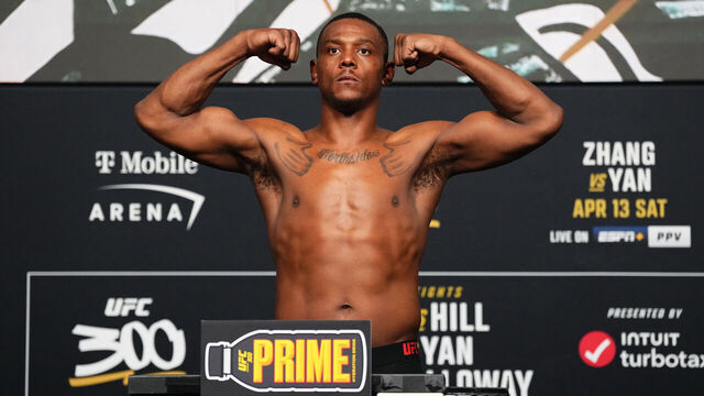 LAS VEGAS, NEVADA - APRIL 12: Jamahal Hill poses on the scale during the UFC 300 official weigh-in at UFC APEX on April 12, 2024 in Las Vegas, Nevada.