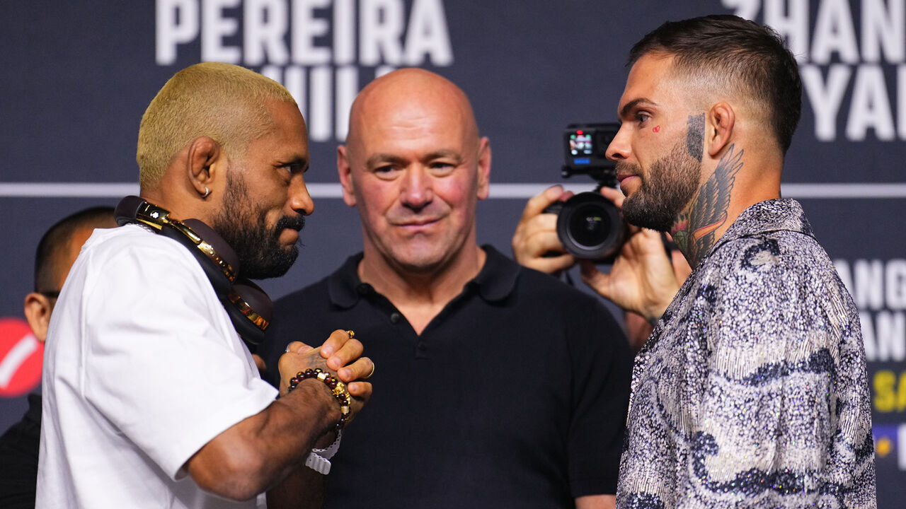 LAS VEGAS, NEVADA - APRIL 11: (L-R) Opponents Deiveson Figueiredo of Brazil and Cody Garbrandt face off during the UFC 300 press conference at MGM Grand Garden Arena on April 11, 2024 in Las Vegas, Nevada.