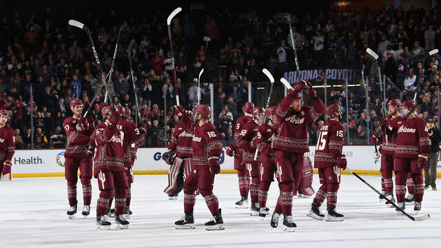 TEMPE, ARIZONA - DECEMBER 27: The Arizona Coyotes salute the crowd after an overtime win against the Colorado Avalanche at Mullett Arena on December 27, 2023 in Tempe, Arizona.