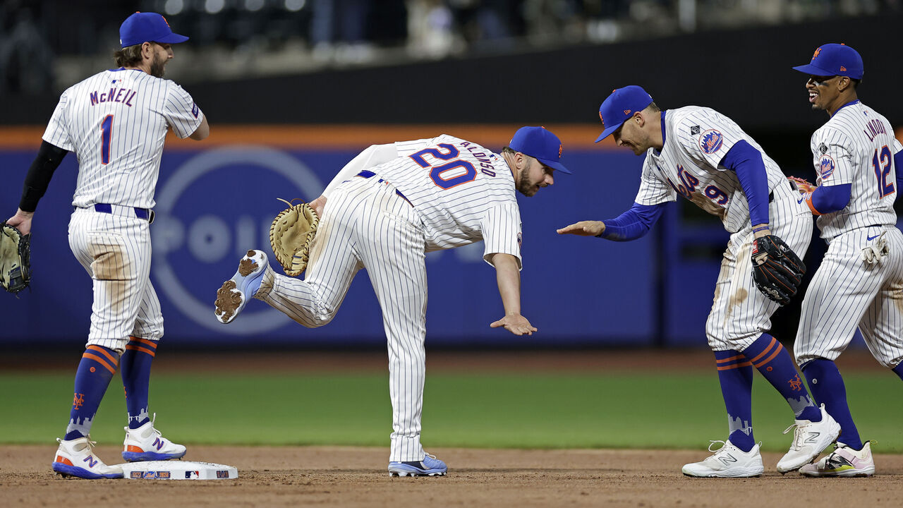 NEW YORK, NY - APRIL 12: Pete Alonso #20 of the New York Mets celebrates with Brandon Nimmo #9 of the New York Mets after the Mets' defeated the Kansas City Royals at Citi Field on April 12, 2024 in New York City. The Mets won 6-1.