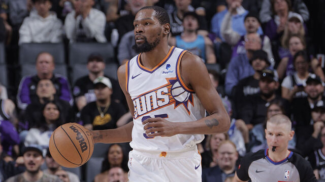 SACRAMENTO, CA - APRIL 12: Kevin Durant #35 of the Phoenix Suns dribbles the ball during the game against the Sacramento Kings on April 12, 2024 at Golden 1 Center in Sacramento, California. Mandatory Copyright Notice: Copyright 2024 NBAE