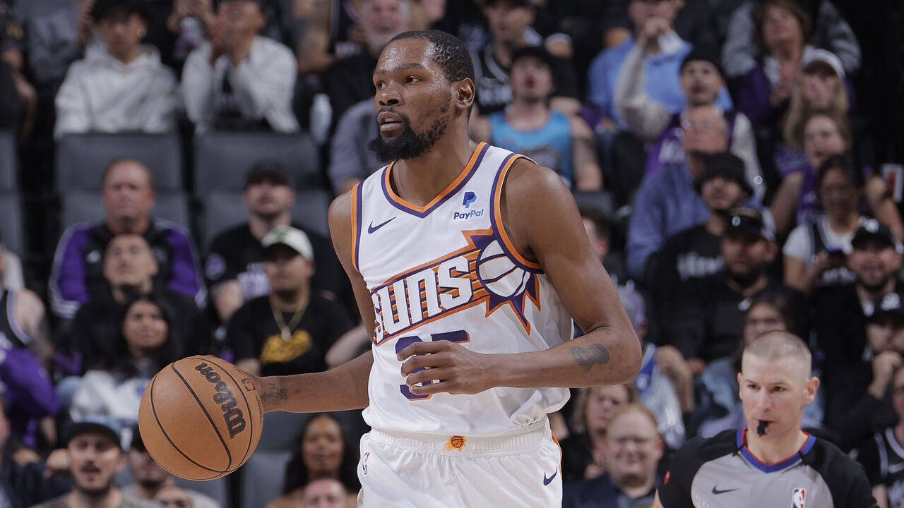 SACRAMENTO, CA - APRIL 12: Kevin Durant #35 of the Phoenix Suns dribbles the ball during the game against the Sacramento Kings on April 12, 2024 at Golden 1 Center in Sacramento, California. Mandatory Copyright Notice: Copyright 2024 NBAE