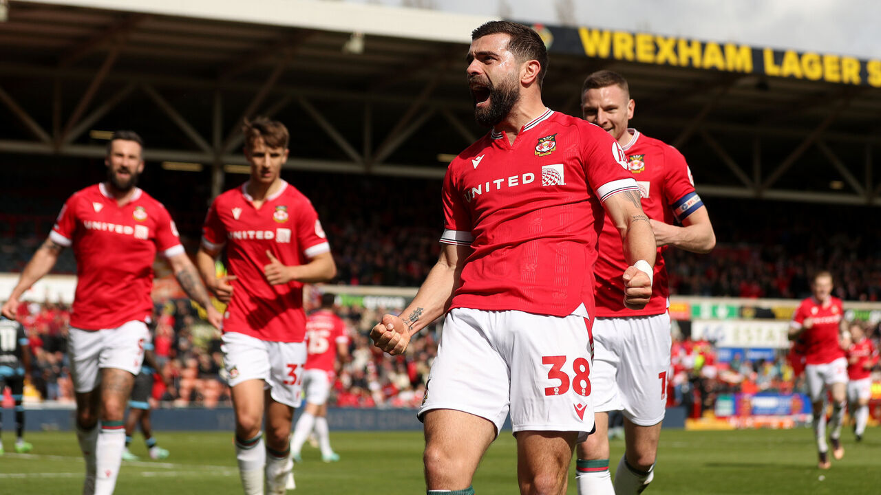 WREXHAM, WALES - APRIL 13: Elliott Lee of Wrexham celebrates scoring his team's first goal during the Sky Bet League Two match between Wrexham and Forest Green Rovers at Racecourse Ground on April 13, 2024 in Wrexham, Wales.