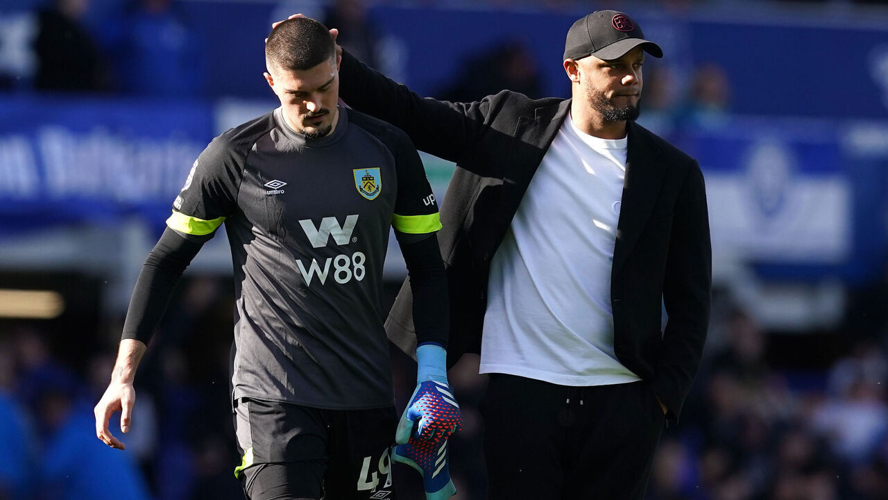 Burnley manager Vincent Kompany (right) with goalkeeper Arijanet Muric after the final whistle in the Premier League match at Goodison Park, Liverpool. Picture date: Saturday April 6, 2024.