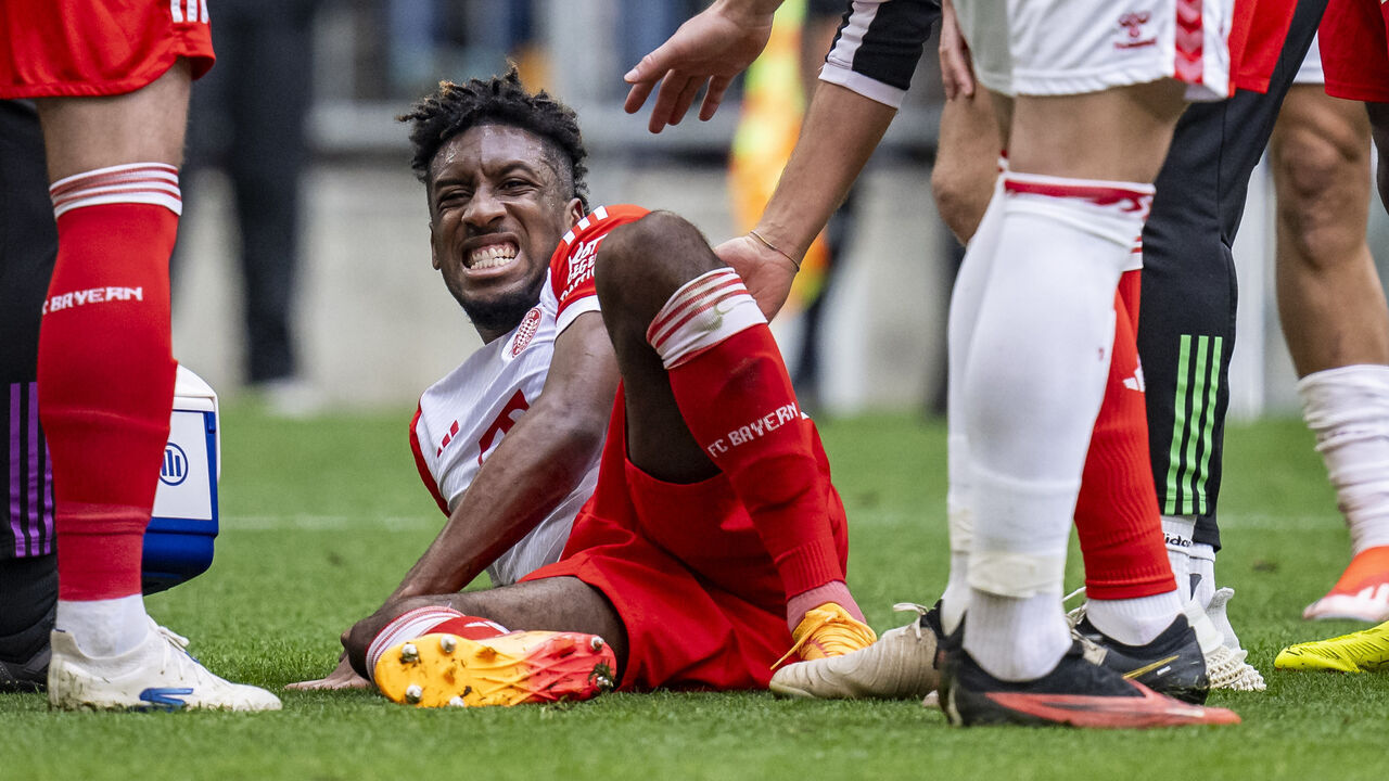 MUNICH, GERMANY - APRIL 13: Kingsley Coman of FC Bayern Muenchen receives medical treatment during the Bundesliga match between FC Bayern München and 1. FC Köln at Allianz Arena on April 13, 2024 in Munich, Germany.