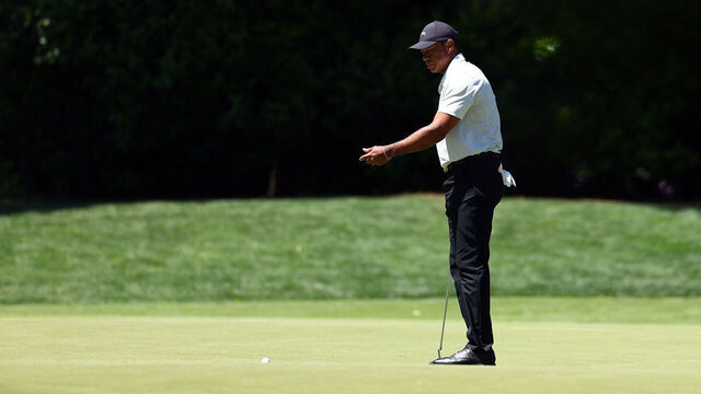 AUGUSTA, GEORGIA - APRIL 13: Tiger Woods of the United States reacts after missing a putt on the fourth green during the third round of the 2024 Masters Tournament at Augusta National Golf Club on April 13, 2024 in Augusta, Georgia.