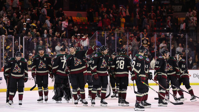 TEMPE, ARIZONA - JANUARY 09: The Arizona Coyotes salute the fans following the NHL game at Mullett Arena on January 09, 2024 in Tempe, Arizona. The Coyotes defeated the Bruins 4-3 in overtime.