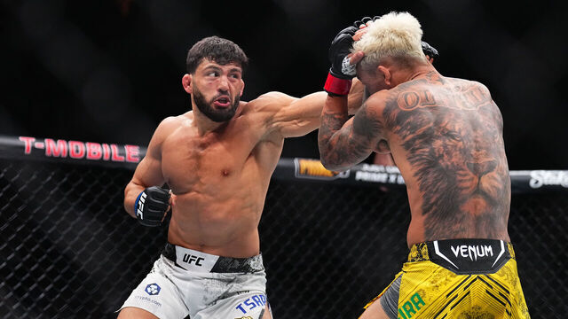 LAS VEGAS, NEVADA - APRIL 13: (L-R) Arman Tsarukyan of Georgia punches Charles Oliveira of Brazil in a lightweight fight during the UFC 300 event at T-Mobile Arena on April 13, 2024 in Las Vegas, Nevada.