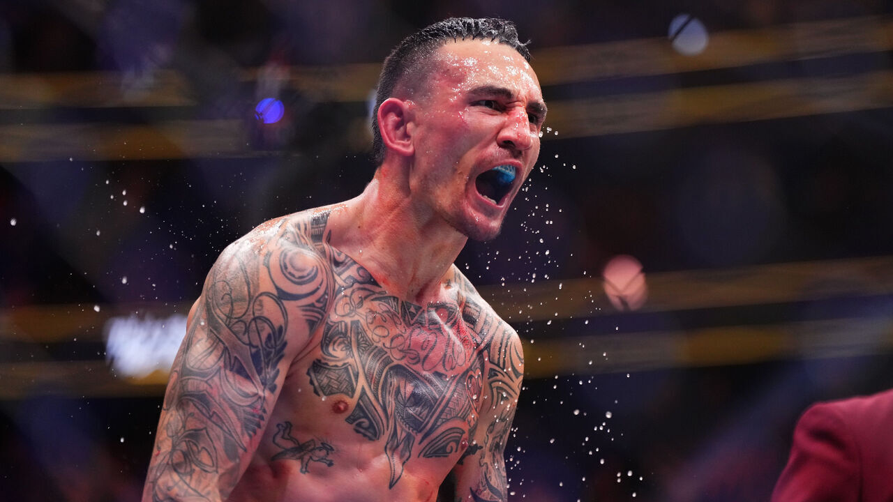 LAS VEGAS, NEVADA - APRIL 13: Max Holloway reacts to his knockout of Justin Gaethje in the BMF championship fight during the UFC 300 event at T-Mobile Arena on April 13, 2024 in Las Vegas, Nevada.