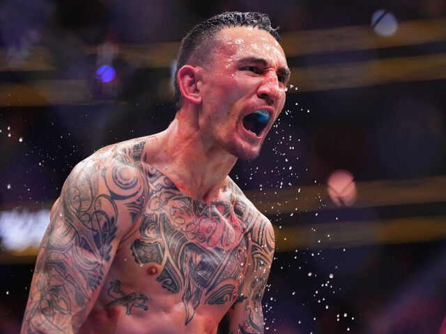 LAS VEGAS, NEVADA - APRIL 13: Max Holloway reacts to his knockout of Justin Gaethje in the BMF championship fight during the UFC 300 event at T-Mobile Arena on April 13, 2024 in Las Vegas, Nevada.