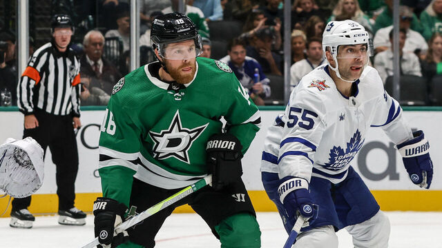 DALLAS, TX - OCTOBER 26: Toronto Maple Leafs defenseman Mark Giordano (55) and Dallas Stars center Joe Pavelski (16) set up in front of Toronto Maple Leafs goaltender Joseph Woll (60) during the game between the Dallas Stars and the Toronto Maple Leafs on October 26, 2023 at American Airlines Center in Dallas, Texas.