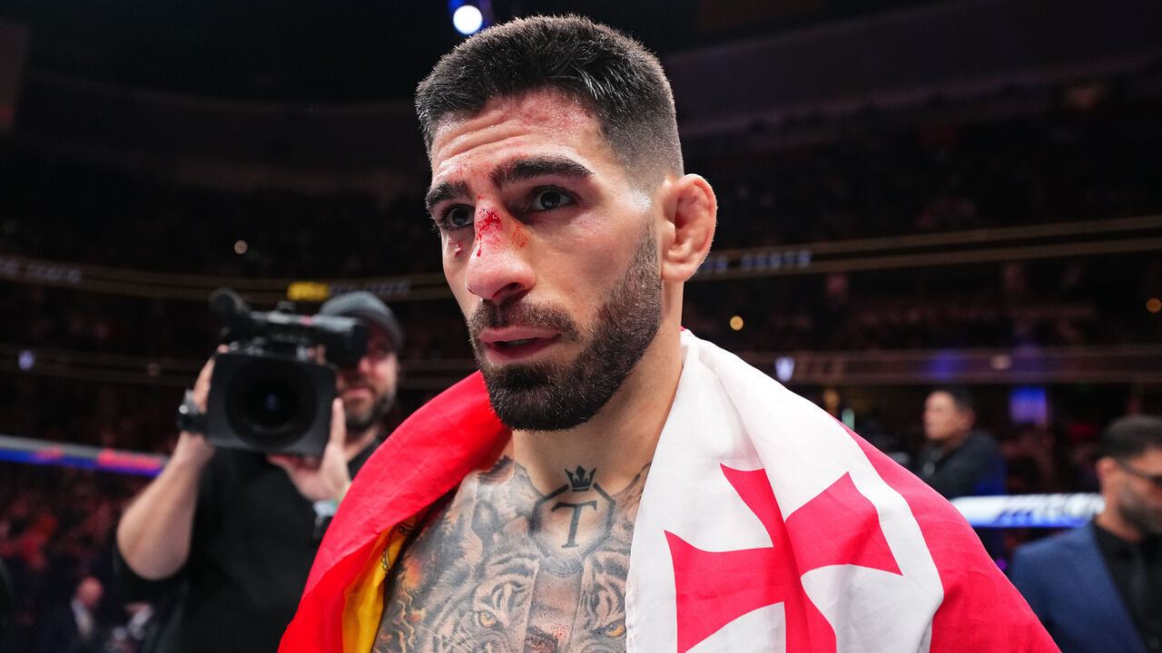 ANAHEIM, CALIFORNIA - FEBRUARY 17: Ilia Topuria of Germany reacts after his knockout victory against Alexander Volkanovski of Australia in the UFC featherweight championship fight during the UFC 298 event at Honda Center on February 17, 2024 in Anaheim, California.