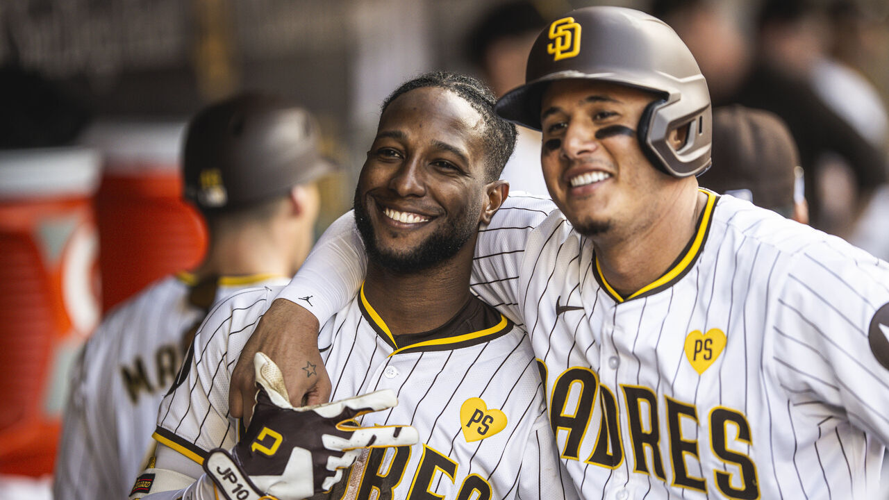 SAN DIEGO, CA - APRIL 10:Jurickson Profar #10 and Manny Machado #13 of the San Diego Padres pose for photo after hitting a home run in the sixth inning against the Chicago Cubs on April 10, 2024 at Petco Park in San Diego, California.