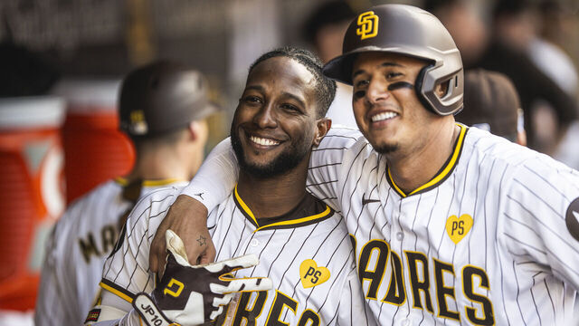 SAN DIEGO, CA - APRIL 10:Jurickson Profar #10 and Manny Machado #13 of the San Diego Padres pose for photo after hitting a home run in the sixth inning against the Chicago Cubs on April 10, 2024 at Petco Park in San Diego, California.