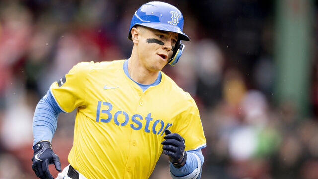 BOSTON, MA - APRIL 14: Tyler O'Neill #17 of the Boston Red Sox rounds the bases after hitting a solo home run during the first inning of a game against the Los Angeles Angels on April 14, 2024 at Fenway Park in Boston, Massachusetts.
