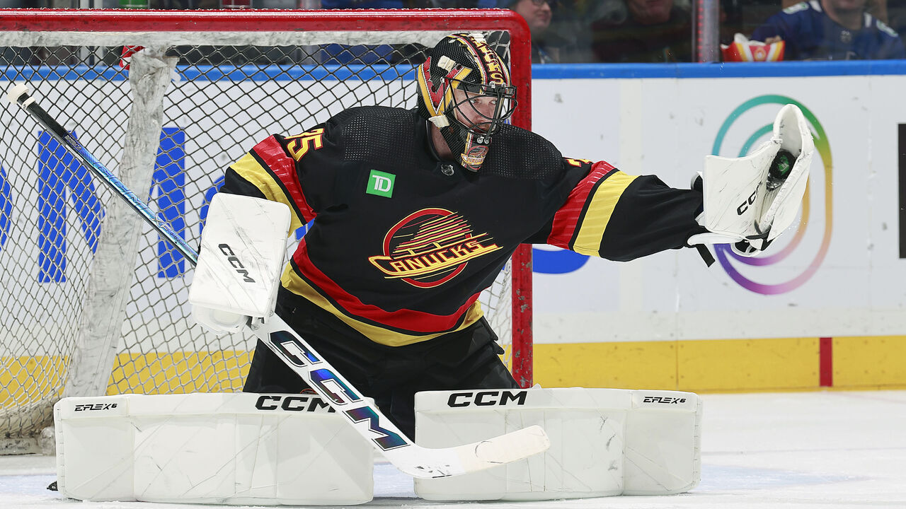 VANCOUVER, CANADA - FEBRUARY 29: Thatcher Demko #35 of the Vancouver Canucks makes a glove save during their NHL game against the Los Angeles Kings at Rogers Arena on February 29, 2024 in Vancouver, British Columbia, Canada.