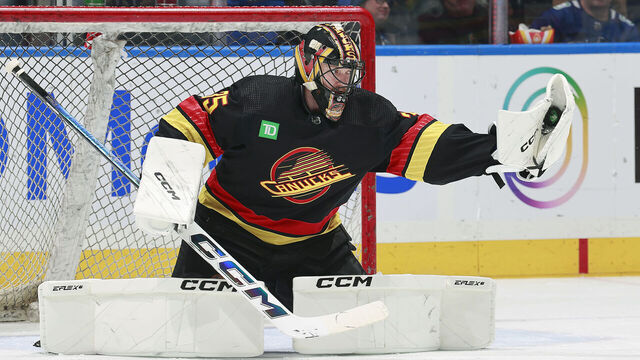 VANCOUVER, CANADA - FEBRUARY 29: Thatcher Demko #35 of the Vancouver Canucks makes a glove save during their NHL game against the Los Angeles Kings at Rogers Arena on February 29, 2024 in Vancouver, British Columbia, Canada.
