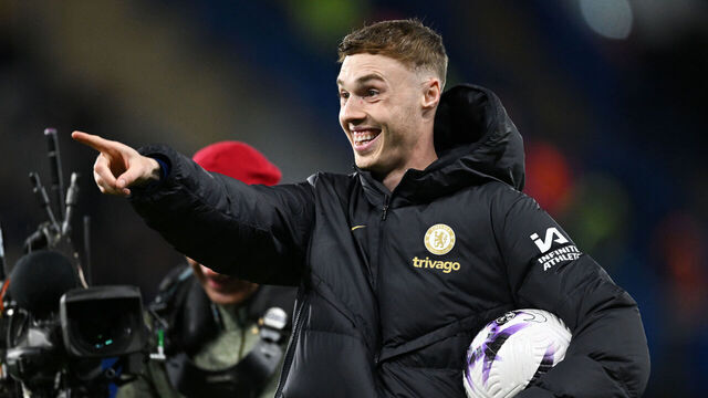 LONDON, ENGLAND - APRIL 15: Cole Palmer of Chelsea celebrates victory whilst holding the match ball, after scoring four goals in the Premier League match between Chelsea FC and Everton FC at Stamford Bridge on April 15, 2024 in London, England.